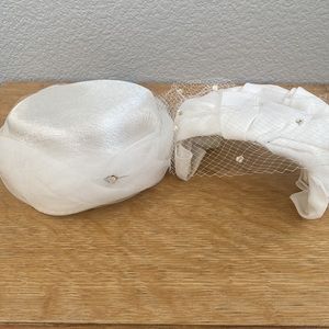 Vintage 1950s wedding style hats.